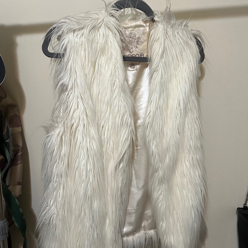 White faux fur vest